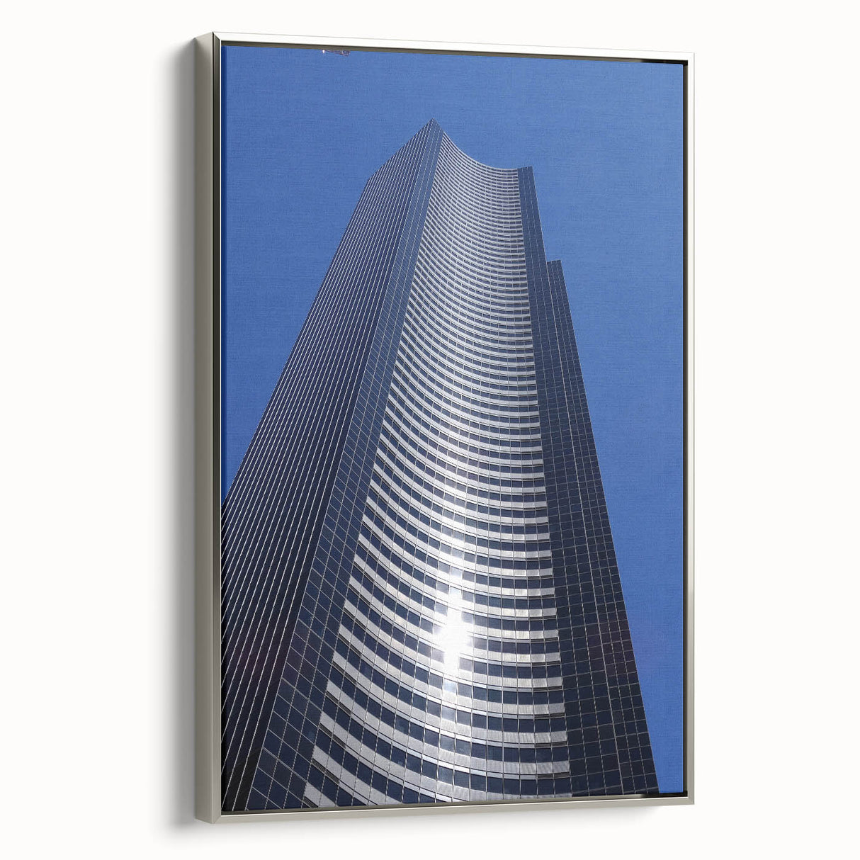 Framed canvas featuring a vintage-style landscape painting of the Seattle skyline in colorful hues.