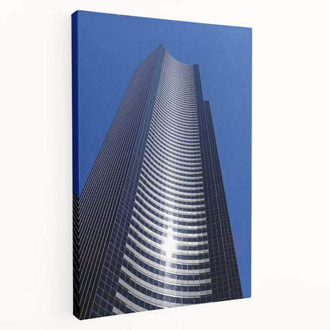 Side view of a stretched canvas featuring a detailed Seattle skyline in muted blue and gray tones.