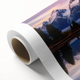 Art deco poster of the Grand Tetons in muted earth tones on rolled canvas, suitable as nursery wall art.