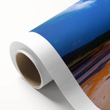 Art Deco style poster of Yellowstone scenery on rolled canvas, featuring muted earth tones, ideal for nursery wall art.