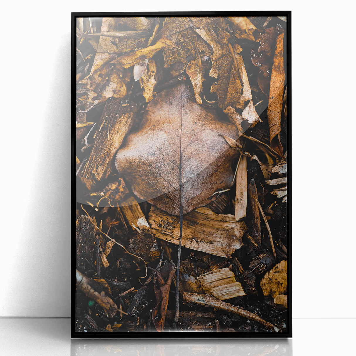 Large abstract wall art featuring autumnal shades on a black acrylic frame, ideal for modern living room decor.