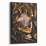 Black and white framed canvas showcasing a vintage landscape painting with autumn trees, ideal for bedroom decor.