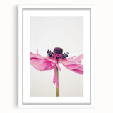 Abstract art print depicting spring with vibrant green and pink tones on a white framed matte canvas.