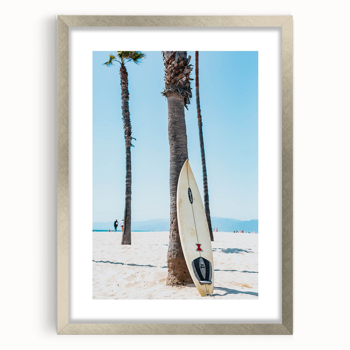 Textured abstract art print in silver frame, featuring swirling blue and gray tones, suitable for bedroom decor.