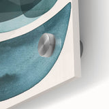 Close-up of abstract minimalist wall art with vibrant acrylic colors on glass, showcasing fluid shapes and textures, perfect for modern decor.