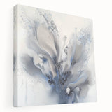Stretched canvas artwork showcasing vibrant abstract florals in rich hues of blue, pink, and gold, designed to enhance modern home decor with artistic flair.