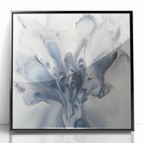 Framed acrylic artwork showcasing a vibrant abstract floral design with black accents, ideal for modern home decor. Perfect for adding a touch of elegance to any room.