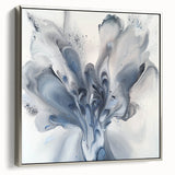 Framed canvas artwork showcasing an abstract floral design with vibrant colors and a silver frame, displayed in a side view to highlight its elegant finish. Perfect for home decor enthusiasts seeking a modern touch.