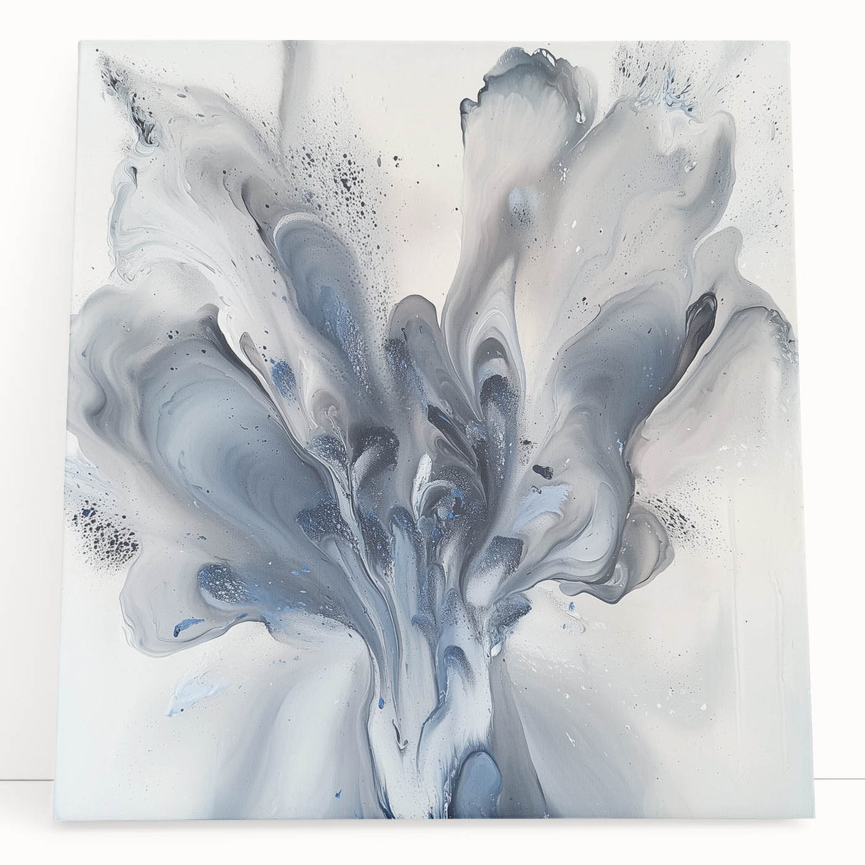 Colorful abstract floral design on stretched canvas, showcasing vibrant hues of pink, blue, and green, ideal for modern home decor or artistic accents. Perfect for adding a fresh, contemporary touch to any room.