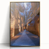 Framed acrylic artwork showcasing a stunning landscape with dramatic caves, accented by a gold frame, ideal for enhancing modern home decor and adding elegance.