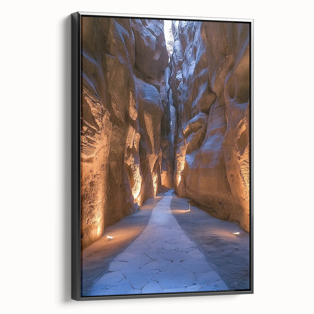 Framed canvas artwork showcasing a stunning landscape with intricate cave formations, designed with a black frame, perfect for enhancing modern home decor.