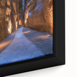 Close-up of a framed canvas featuring a stunning landscape design with caves, showcasing intricate details and vibrant colors, ideal for home decor.