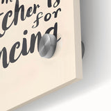 Large abstract wall art in vibrant orange and teal hues on acrylic glass, suitable for dining room ambiance.