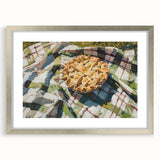 Textured art depicting abstract pastries in muted brown tones on a framed silver mat, suitable for bedroom decor.