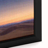 Close-up of a beautifully framed desert landscape canvas, showcasing vibrant colors and intricate details of the arid terrain, ideal for modern home decor.