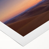 Desert landscape rolled canvas art print showcasing vibrant orange and yellow hues with intricate details of sand dunes and a clear blue sky, ideal for home decor.