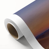 Desert landscape rolled canvas artwork showcasing vibrant hues of orange and gold, depicting a serene sunset over sand dunes, elegantly packaged in a protective tube.