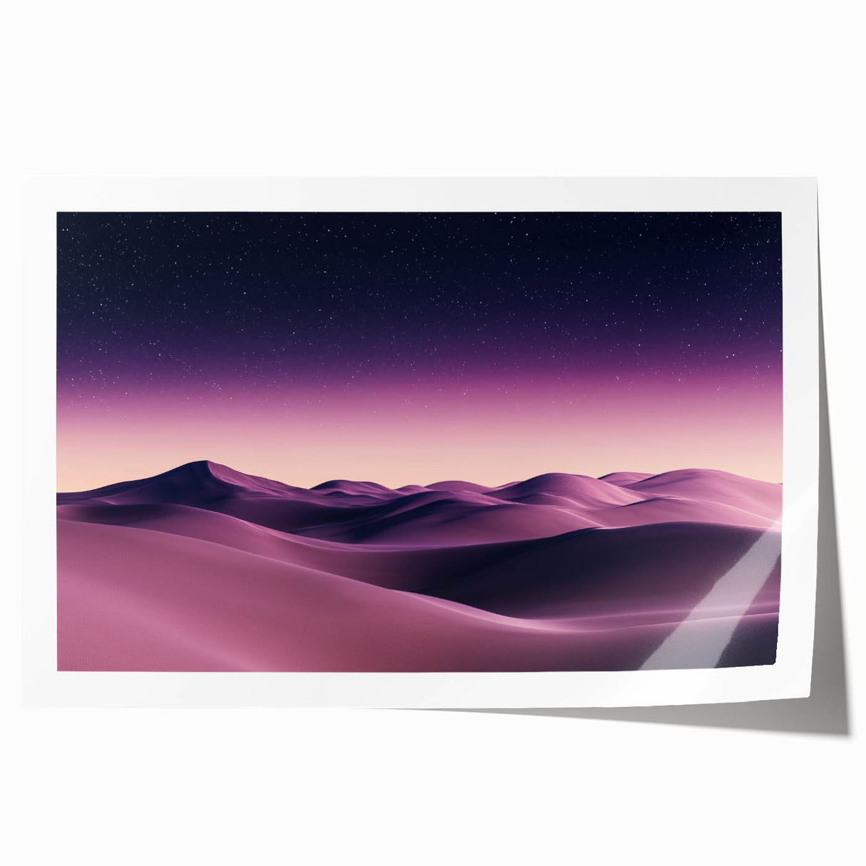 Dramatic landscape print showcasing rolling sand dunes under a bright blue sky, rolled up for delivery in a protective cardboard tube, ideal for home decor.