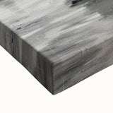 Close-up of a stretched canvas artwork depicting serene landscapes with vibrant colors and intricate details, highlighting natural beauty for home decor.