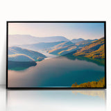 Large abstract wall art depicting a European Albanian scenery in muted earth tones, framed in black acrylic.