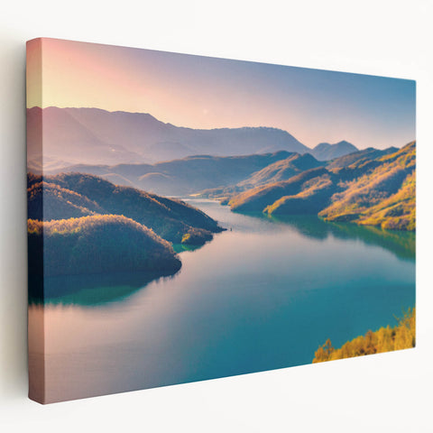 Landscape painting of a European countryside on stretched canvas, featuring soft green and earth tones.