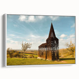 Vintage poster art of a European Belgian landscape on a framed canvas, featuring a blend of colorful and black tones.