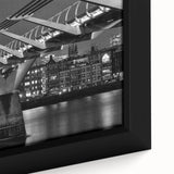 Close-up of black wall art featuring a textured London skyline in vibrant colors on a framed canvas.