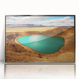 Large art print of a serene Icelandic landscape in muted blue and green tones, framed in silver acrylic.