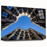 Large abstract wall art of Barcelona scenery in muted earth tones on acrylic glass.