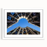 Textured abstract art print of Barcelona scenery in muted earth tones on a framed canvas, ideal for bedroom art.