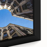 Close-up of a textured, extra large black wall art depicting Barcelona scenery on framed canvas.