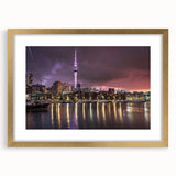 Extra large abstract art print of Auckland skyline in textured gold frame, ideal for living room decor.