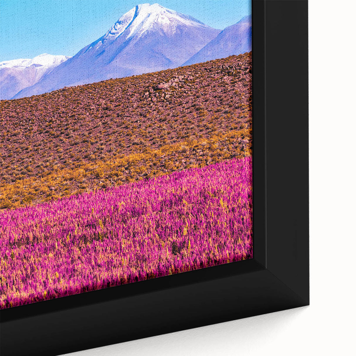 Extra large framed canvas of a textured black wall art featuring colorful Bolivian scenery, ideal for living room decor.