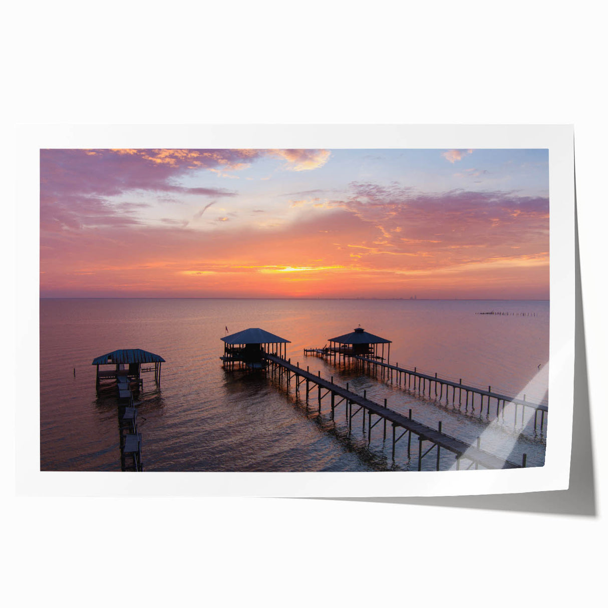 Rolled print of a serene Alabama landscape with soft floral elements in muted earth tones, ideal for dining room wall art.