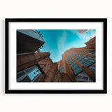 Colorful abstract art print of Charlotte skyline, in vibrant hues on a large textured canvas, ideal for living room decor.