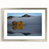 Textured art print depicting abstract scenery of Vermont in muted earth tones, framed in silver.