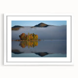 Abstract art print of Vermont scenery in muted green and blue tones on a white framed poster, suitable for dining room decor.