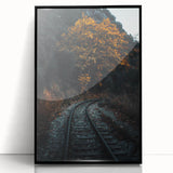 Large abstract wall art depicting autumnal trees in vibrant orange and red, framed in black acrylic.