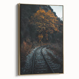 Framed canvas depicting a vintage-style autumn landscape with gold and black tones, ideal for bedroom wall decor.