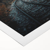 Art deco poster of a stylized autumn landscape on rolled canvas, featuring warm orange and brown tones.