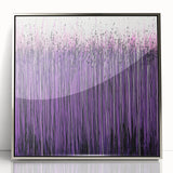 Framed acrylic artwork showcasing an abstract floral design in vibrant colors, with a sleek silver frame, perfect for modern home decor and adding elegance to any space.