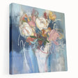 Abstract floral design stretched canvas artwork showcasing vibrant colors and intricate patterns, displayed elegantly from the side to highlight its depth and texture. Perfect for enhancing home decor with a modern artistic touch.