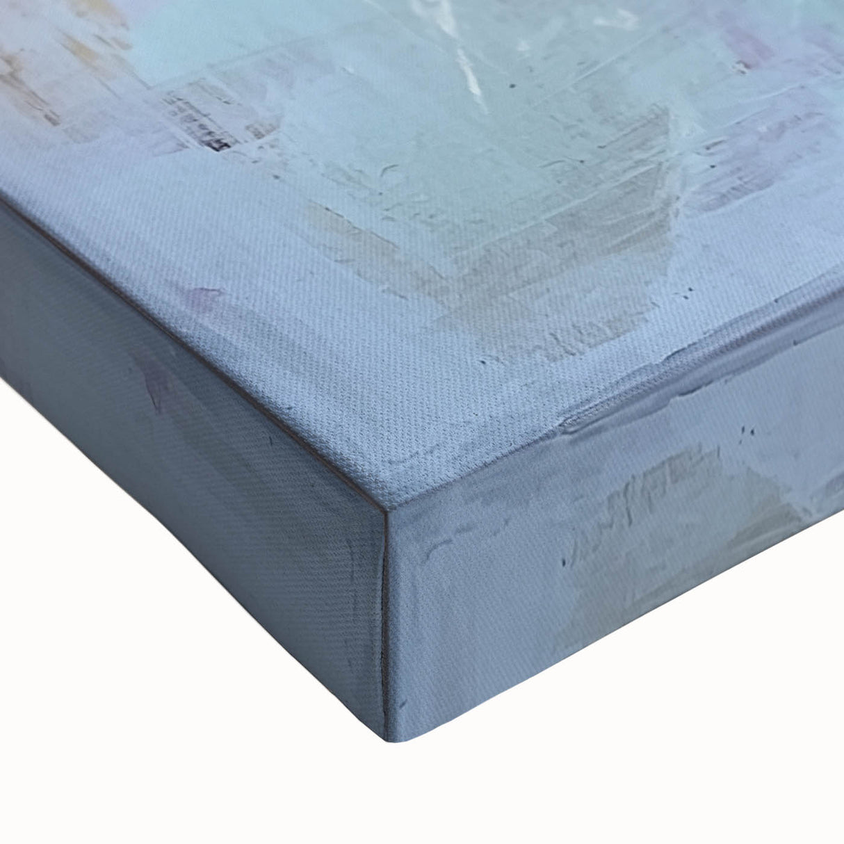 Close-up of an abstract floral canvas print showcasing vibrant colors like deep blues, lush greens, and soft pinks, perfect for modern home decor.