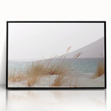 Large abstract wall art featuring swirling blue and gray tones on acrylic, framed in black.