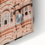 Close-up view of a vibrant acrylic glass artwork depicting a serene landscape with a majestic castle, showcasing intricate details and rich colors, perfect for home decor.