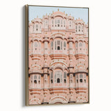 Framed canvas artwork depicting a picturesque landscape with a majestic castle, featuring a gold frame that enhances the vibrant colors and intricate details. Perfect for home decor, this elegant piece adds a touch of sophistication to any room.