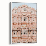 Framed canvas artwork depicting a serene landscape with a majestic castle, featuring vibrant colors and intricate details, displayed against a white background.