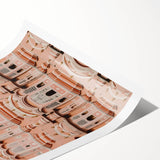 Rolled canvas print showcasing a picturesque landscape with a majestic castle, featuring vibrant colors and intricate details, securely packaged in a protective tube for safe transport.