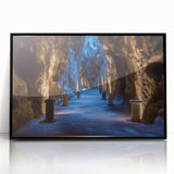 Framed acrylic artwork showcasing a stunning landscape of caves, featuring rich colors and intricate details, set against a sleek black frame for modern decor.