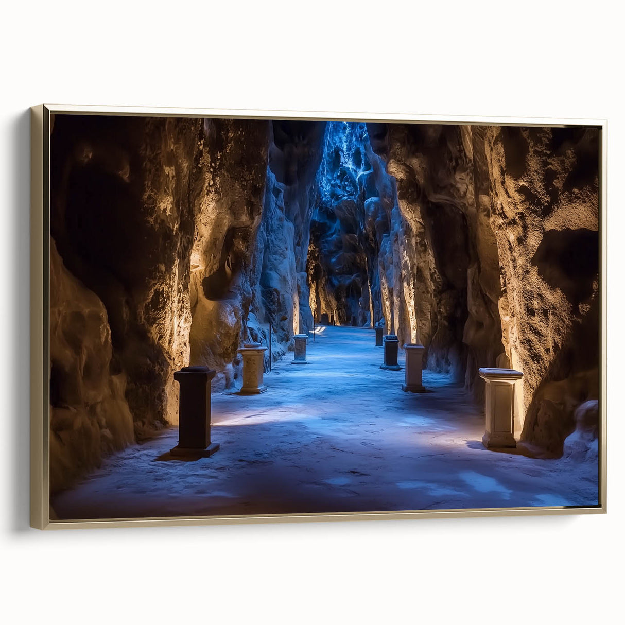 Framed canvas artwork showcasing a stunning landscape scene with caves, featuring a gold side frame, perfect for enhancing modern home decor.